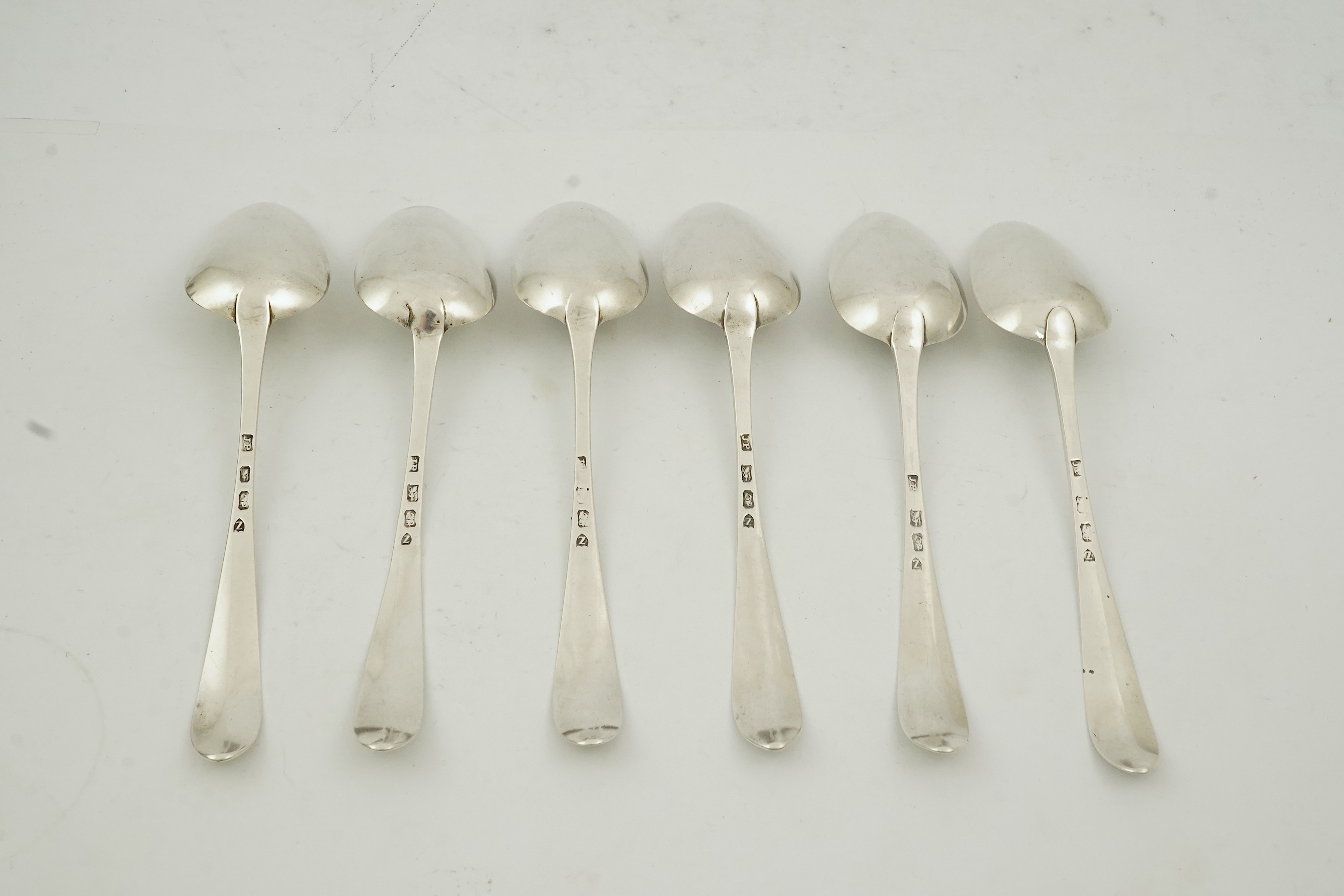 Five Victorian silver Old English pattern dessert spoons, by George Adams, London, 1880 and three other matched dessert spoons by Roberts & Dore, Sheffield, 1931, 11.6oz. Condition - fair